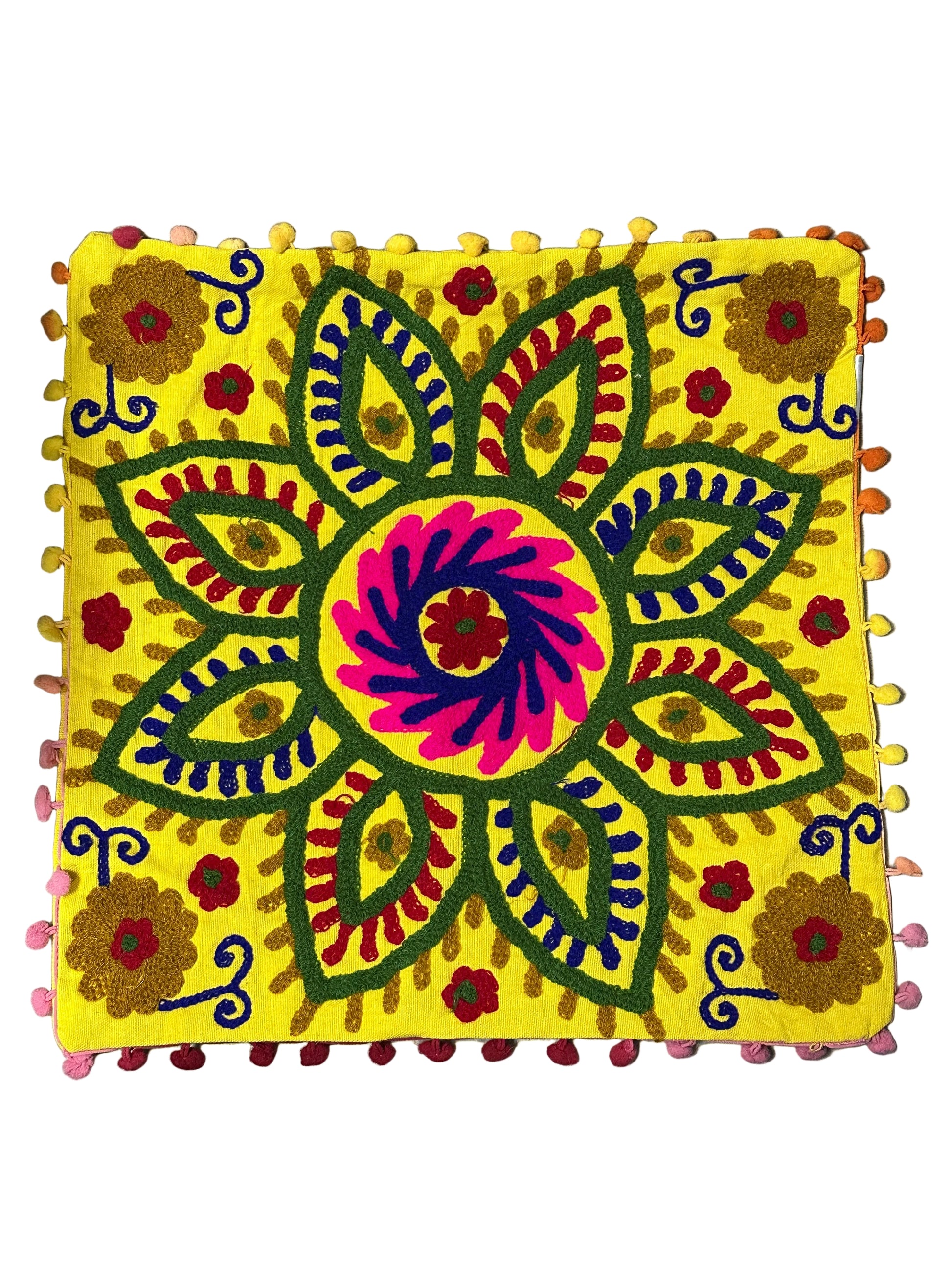 Decorative pillow with a colorful floral pattern on a plain background